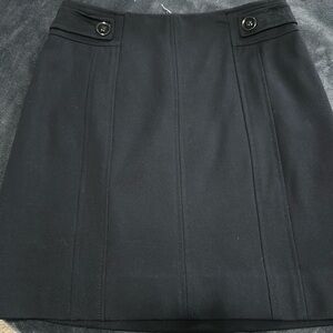 Skirt barely worn. Excellent condition zip up back